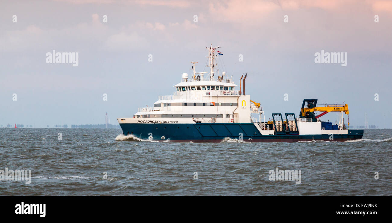 Offshore dive support vessel, Noordhoek Pathfinder, conducting UXO (unexploded ordnance) diving operations Stock Photo