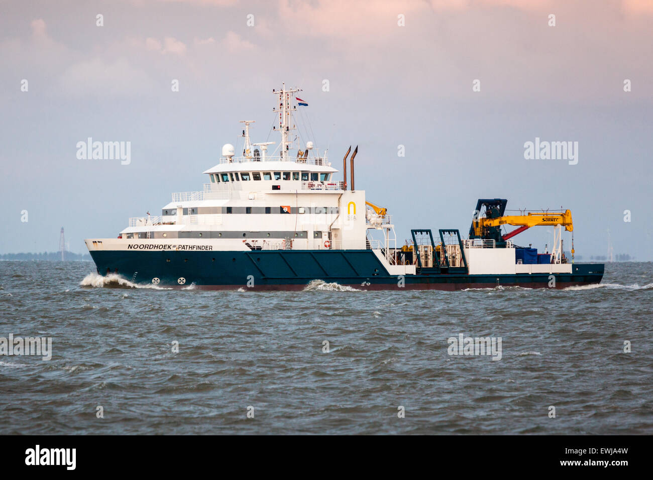 Offshore dive support vessel, Noordhoek Pathfinder, conducting UXO (unexploded ordnance) diving operations Stock Photo