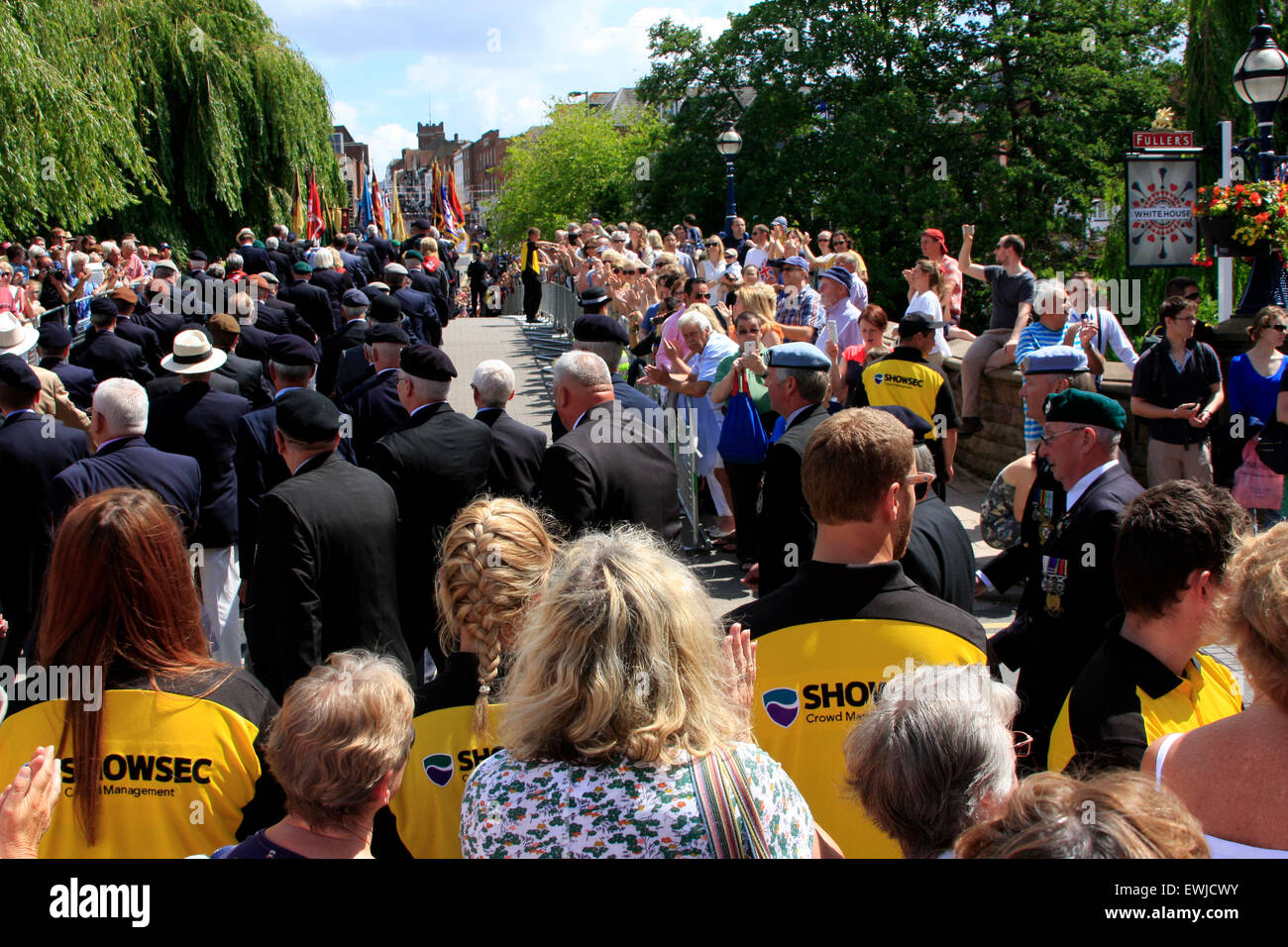 Guildford, Surrey, UK. 27th June, 2015. Armed Forces Day parade in Guildford High Street. Armed Forces Veterans marching to Guildford High Street which has been closed off to allow local people and the wider communuty to watch the parade and thank everyone in the Armed Forces Credit:  Bruce McGowan/Alamy Live News Stock Photo