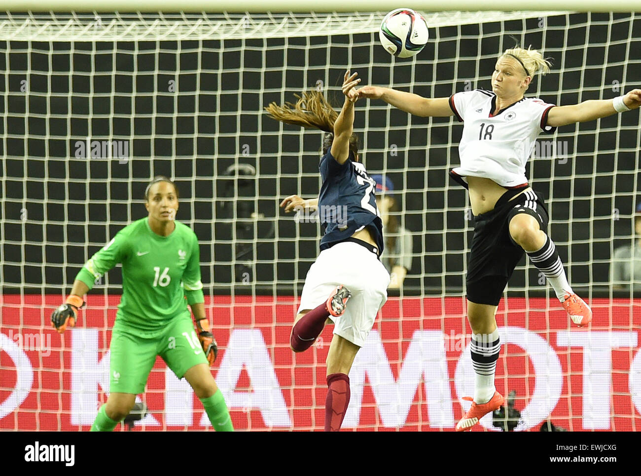 Montreal, Canada. 26th June, 2015. Germany's Alexandra Popp (R) and Amel Majri of France, left side French goalkeeper Sarah Bouhaddi vie for the ball during the FIFA Women«s World Cup 2015 quarter final soccer match between Germany and France at the Olympic Stadium in Montreal, Canada, 26 June 2015. Photo: Carmen Jaspersen/dpa/Alamy Live News Stock Photo
