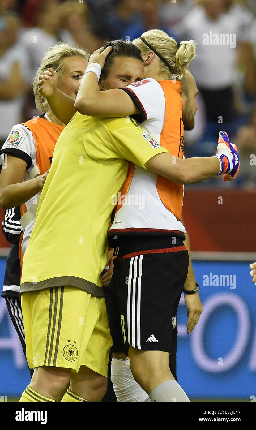 Montreal, Canada. 26th June, 2015. Germany's goalkeeper Nadine Angerer celebrate the victory with Alexandra Popp (R) after the FIFA Women«s World Cup 2015 quarter final soccer match between Germany and France at the Olympic Stadium in Montreal, Canada, 26 June 2015. Photo: Carmen Jaspersen/dpa/Alamy Live News Stock Photo