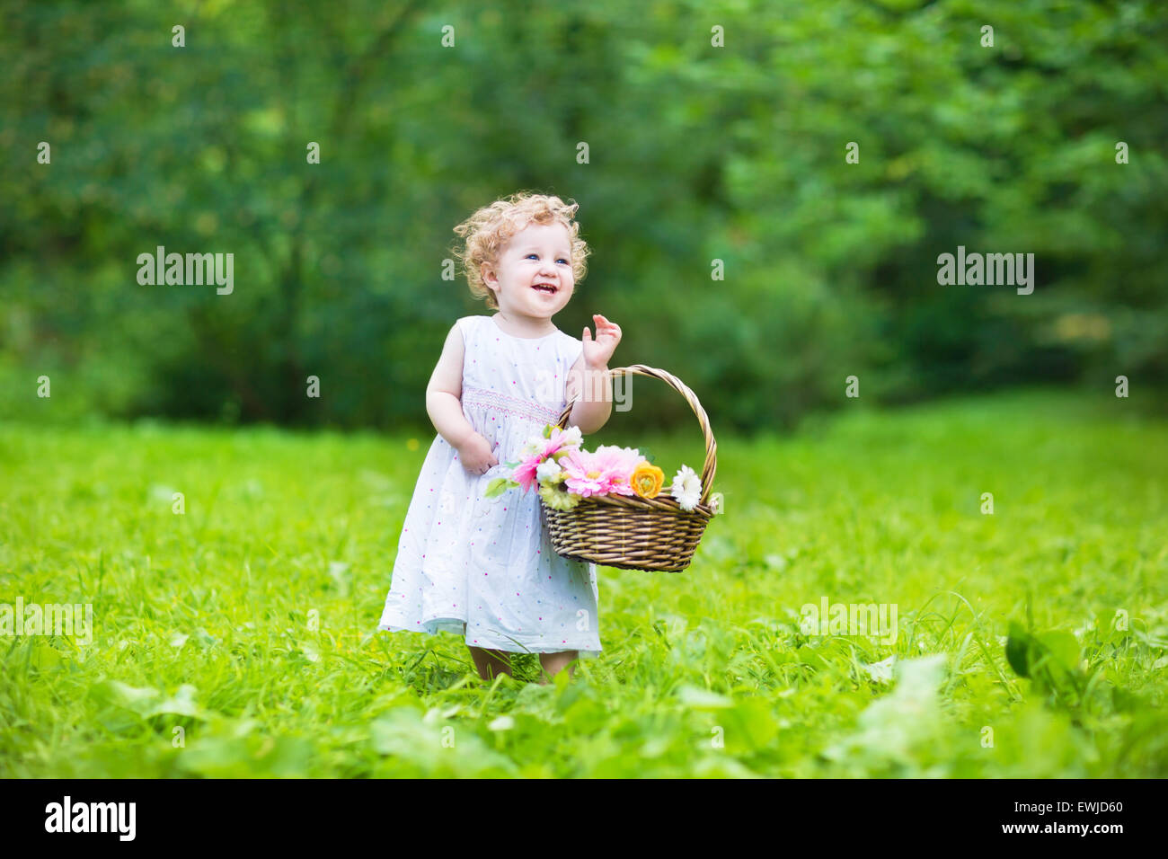 beautiful baby girl with flowers