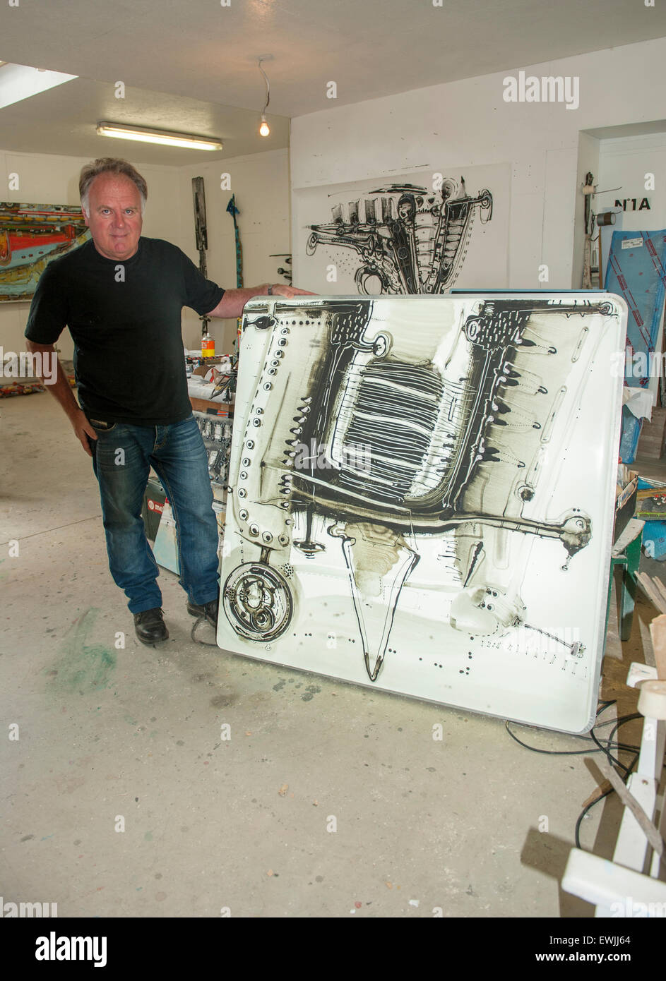 French recycling artist Patrick Chappert-Gaujal with a 2015 artwork Stock Photo
