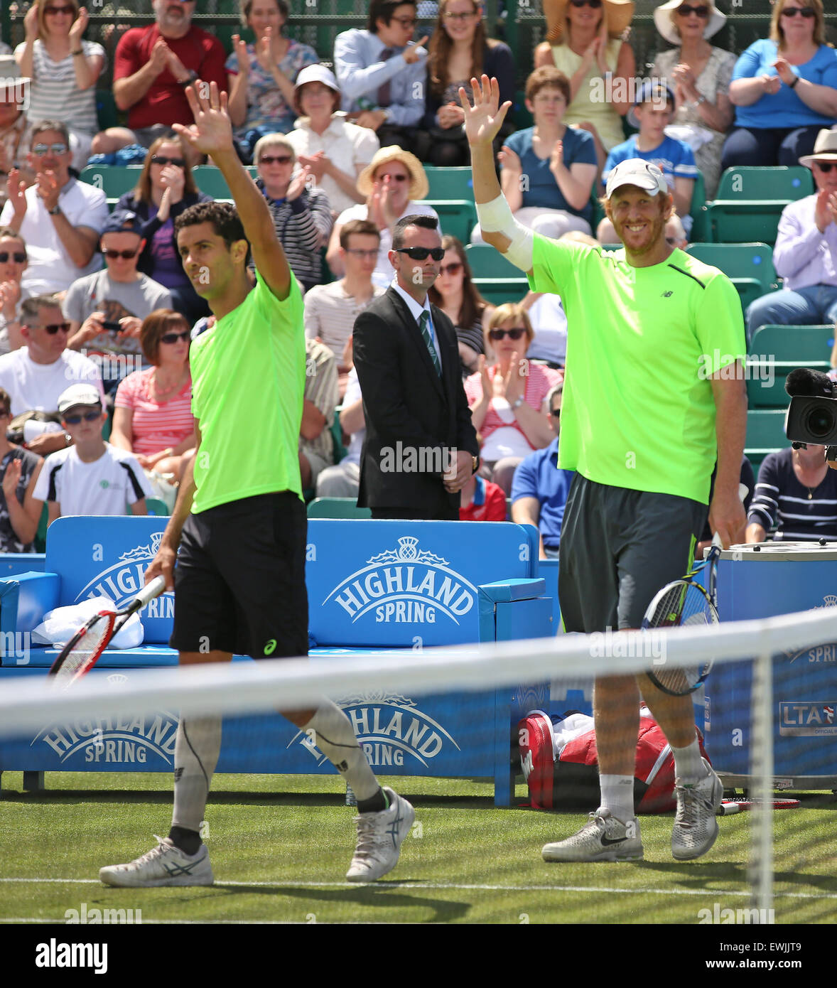 Nottingham, UK. 27th June, 2015. Aegon Nottingham Open Tennis Tournament. Chris Guccione and Andre Sa acknowledge the crowd after their victory in the men's double final on centre court Credit:  Action Plus Sports/Alamy Live News Stock Photo