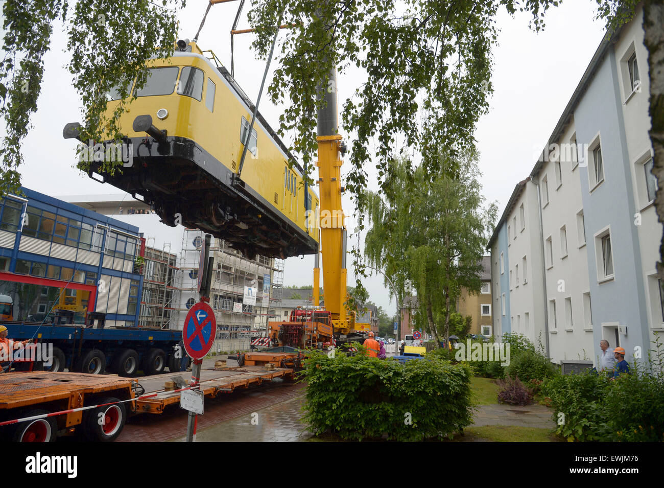 Brunswick, Germany. 27th June, 2015. A rail bus hangs suspended from a ...