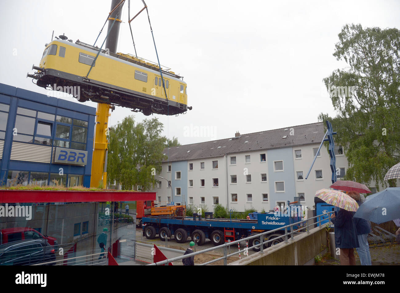 Brunswick, Germany. 27th June, 2015. A rail bus hangs suspended from a ...
