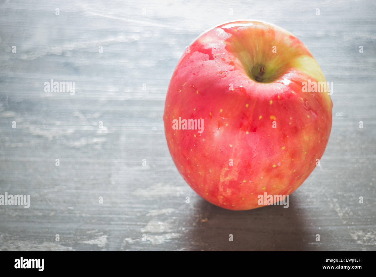 Red apple on the table, stock photo Stock Photo