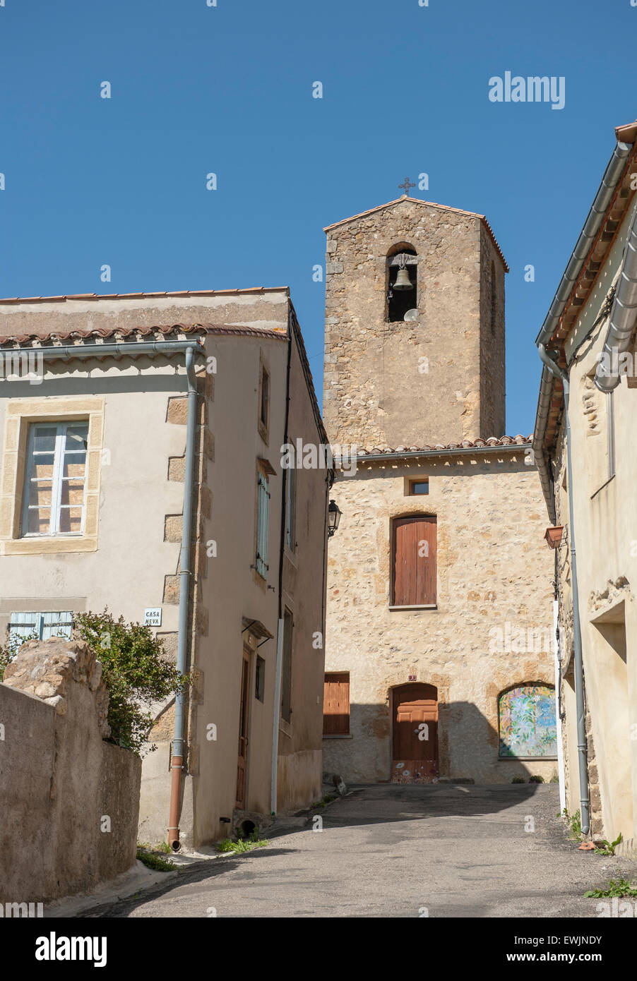 The tiny Corbières village of Bugarach preserved its rural architecture with natural rock Stock Photo