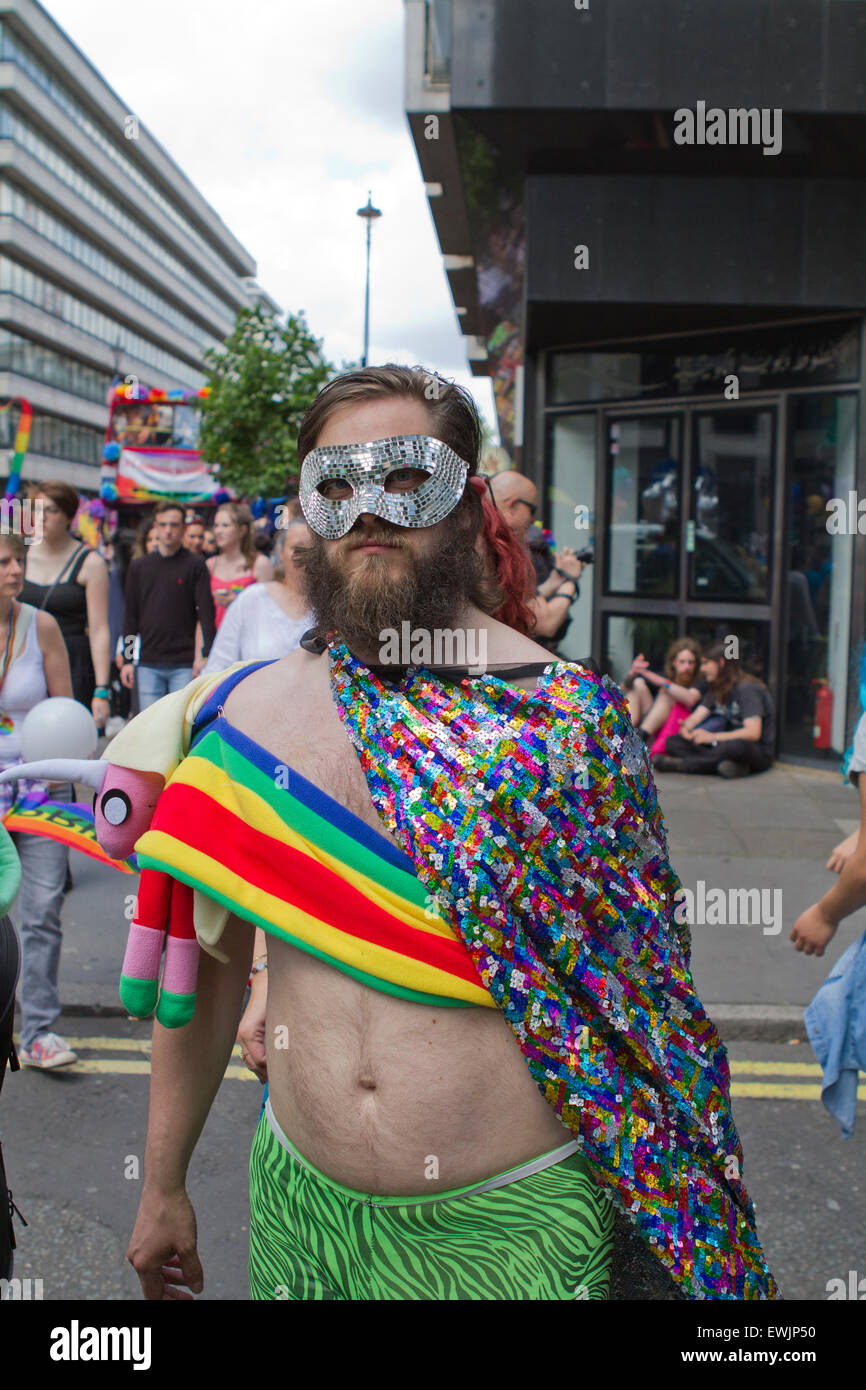 A masked man dressed up, celebrates Gay Pride in London Stock Photo