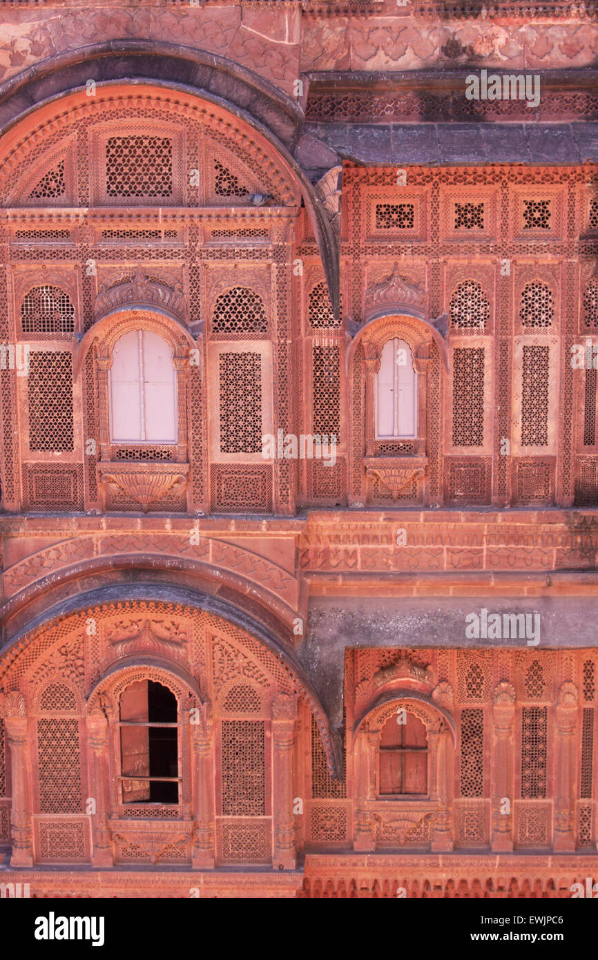 Front of one of the several sandstone palaces contained within the Mehrangarh fort complex on a hill overlooking Jodhpur, India Stock Photo