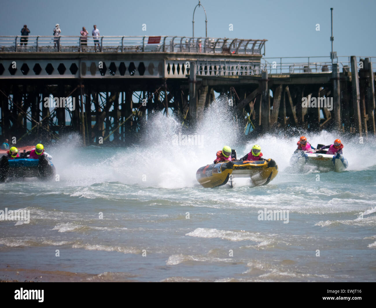 Portsmouth, England, june 27th 2015. Inflatable Catamarans race past
