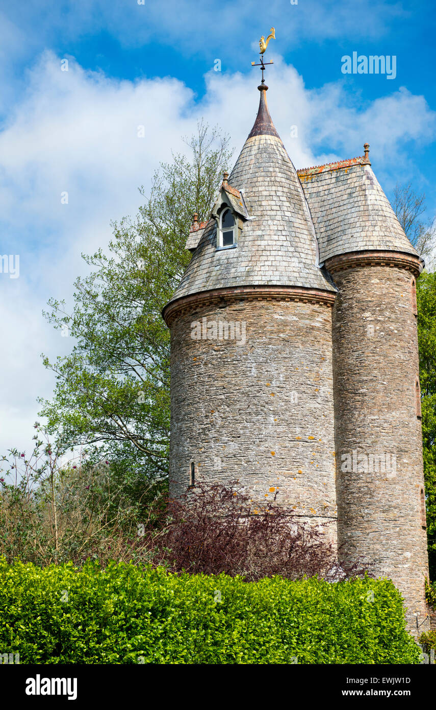 Fairytale stone tower with conical roof at Trelissick house and gardens in Cornwall, England, UK Stock Photo