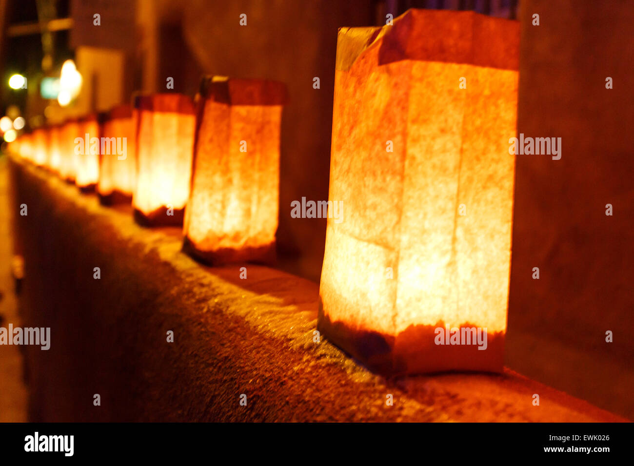 Holiday luminaria lights illuminate street at night Stock Photo Alamy