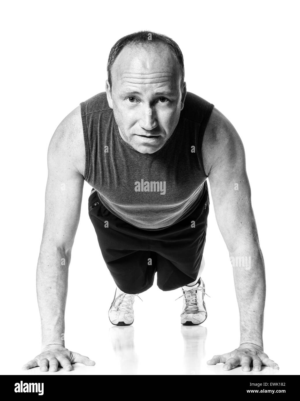 Push up exercise. Studio shot over white Stock Photo Alamy
