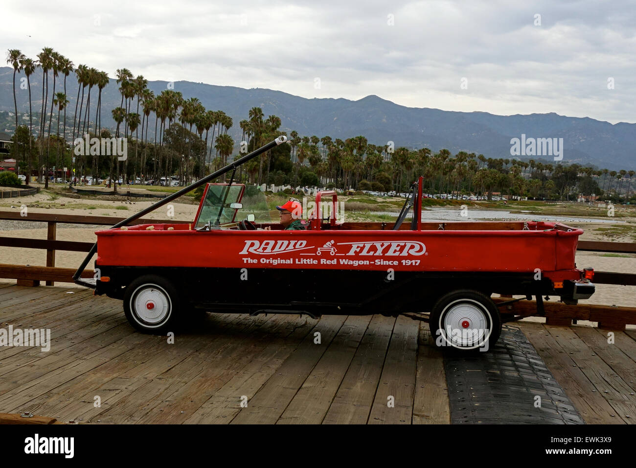 A Car Converted To Look Like A Radio Flyer The Original Little Red Wagon Drives Down Stearns Wharf In Santa Barbara California Stock Photo Alamy