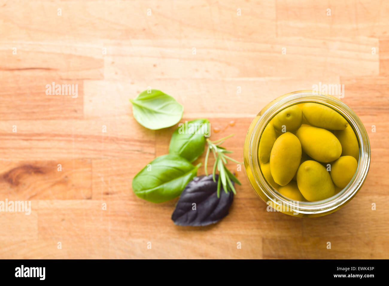 the pickled green olives in jar Stock Photo Alamy
