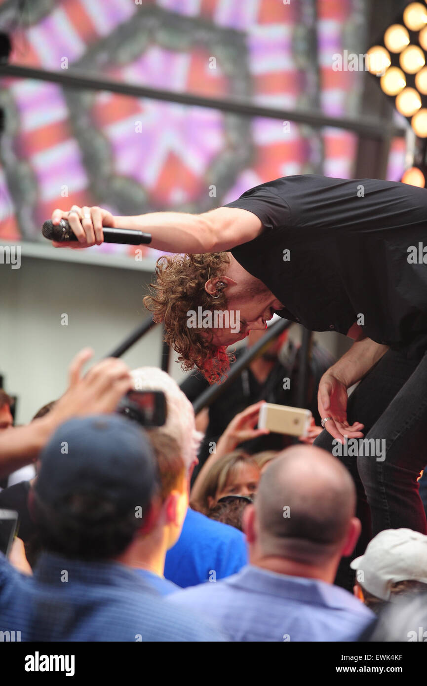 New York, NY. 26th June 2015. American band Imagine Dragons performs 'Radioactive' and 'Demons' on NBC's TODAY Show. In picture, lead singer Dan Reynolds. Christoper Childers/EXimages.com Stock Photo