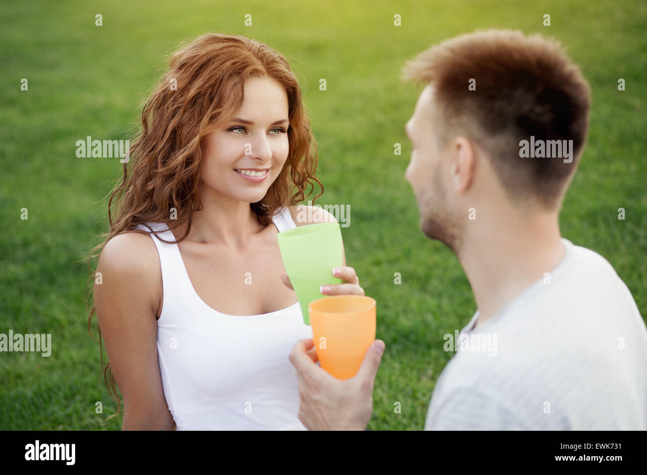 Couple in picnic Stock Photo - Alamy