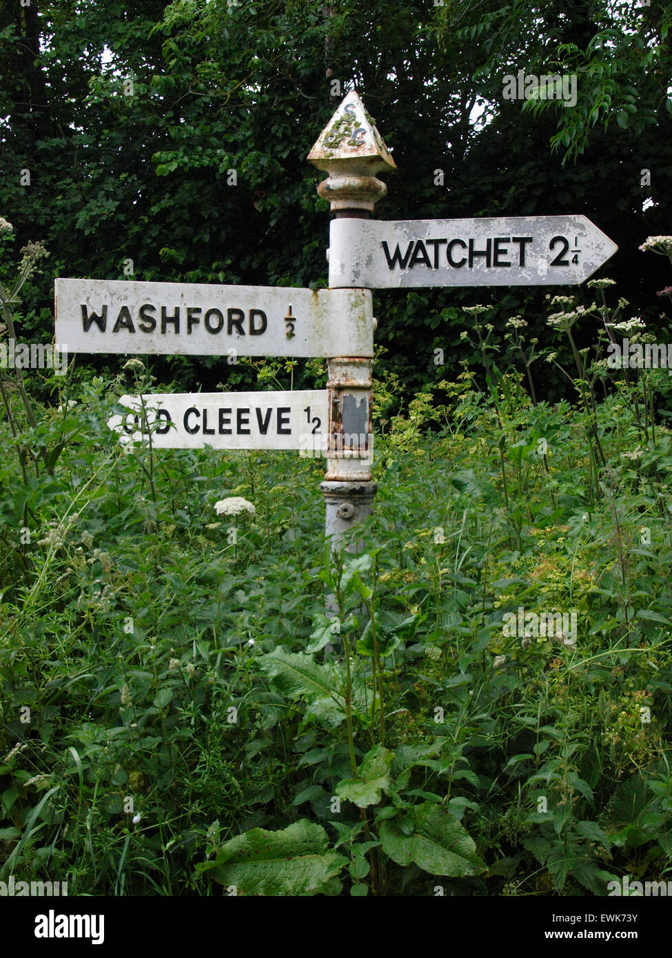 Old style metal road sign for Watchet, Washford and Old Cleeve