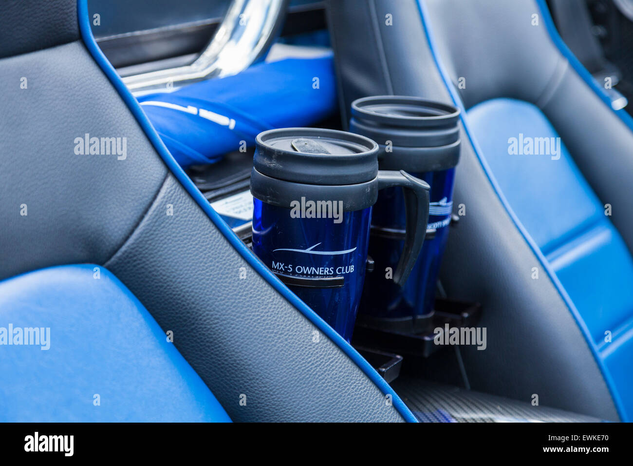 Mazda MX5 car displaying drinking mugs labeled Mazda Owners Club Stock Photo