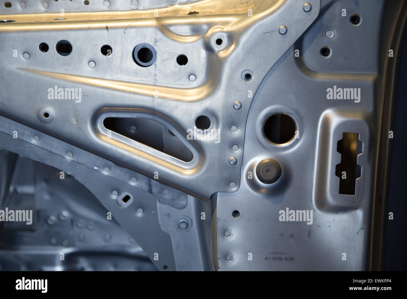 Car chassis on display at coventry transport museum Stock Photo Alamy