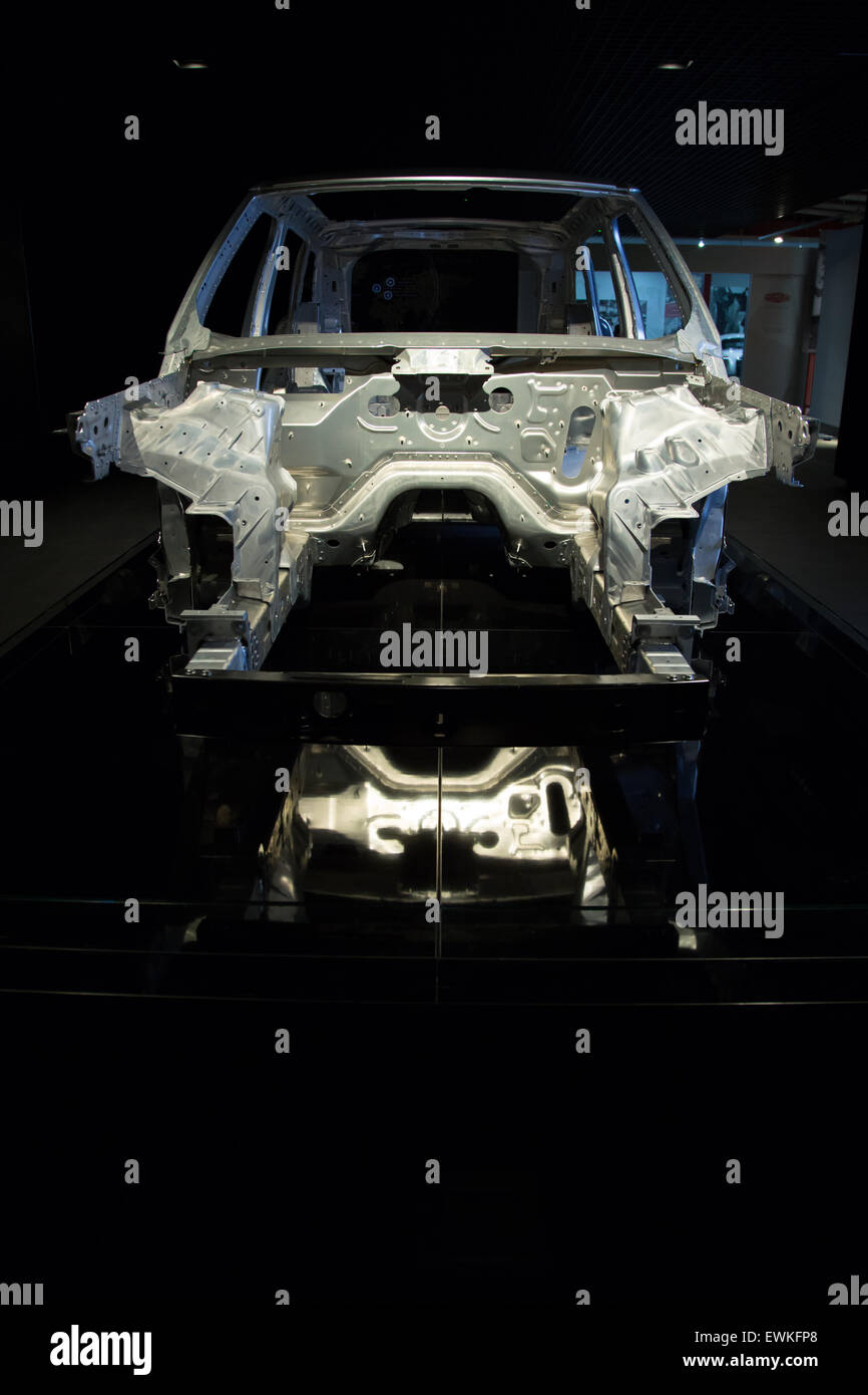 Car chassis on display at coventry transport museum Stock Photo Alamy