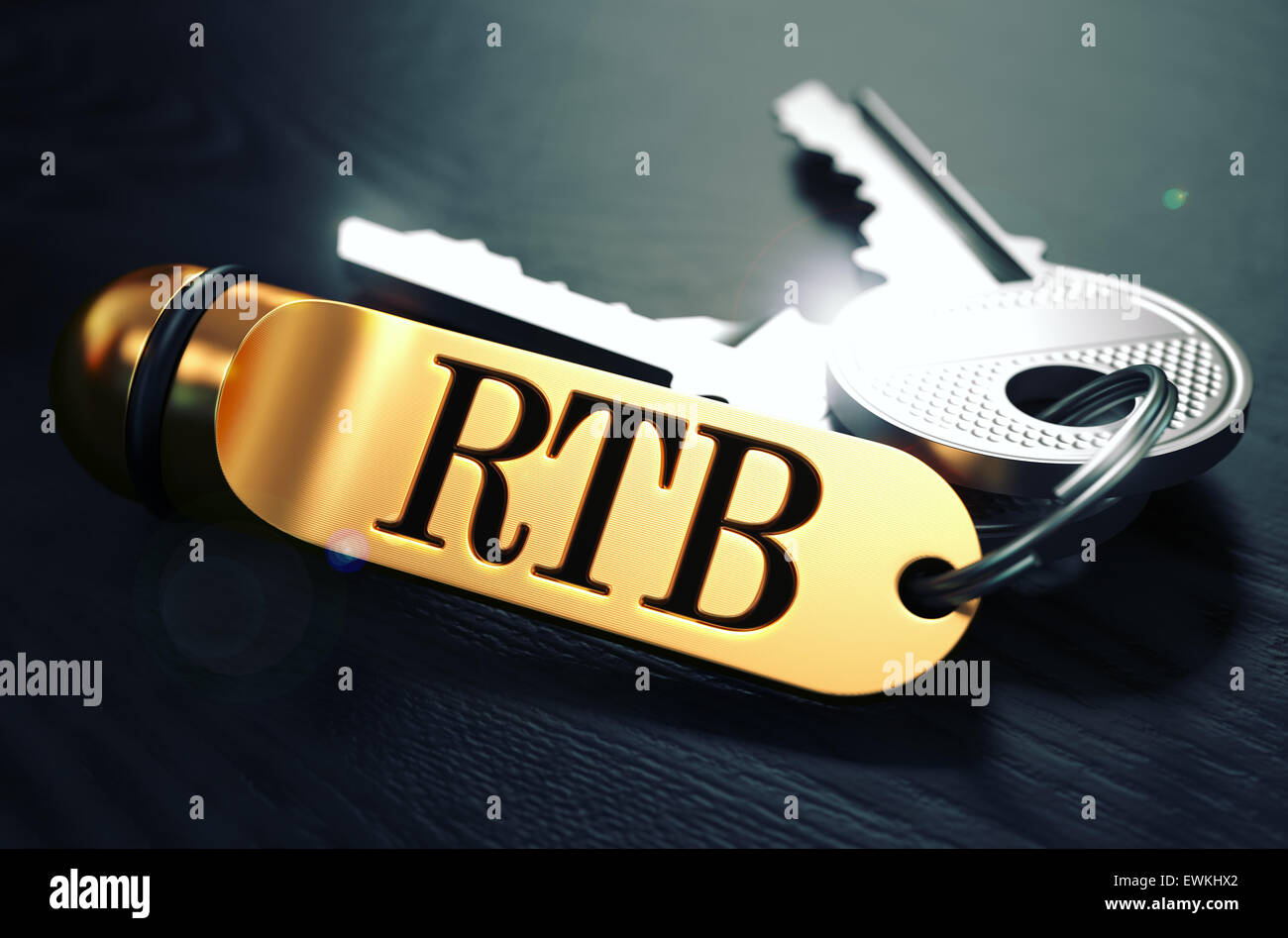 RTB - Bunch of Keys with Text on Golden Keychain. Stock Photo