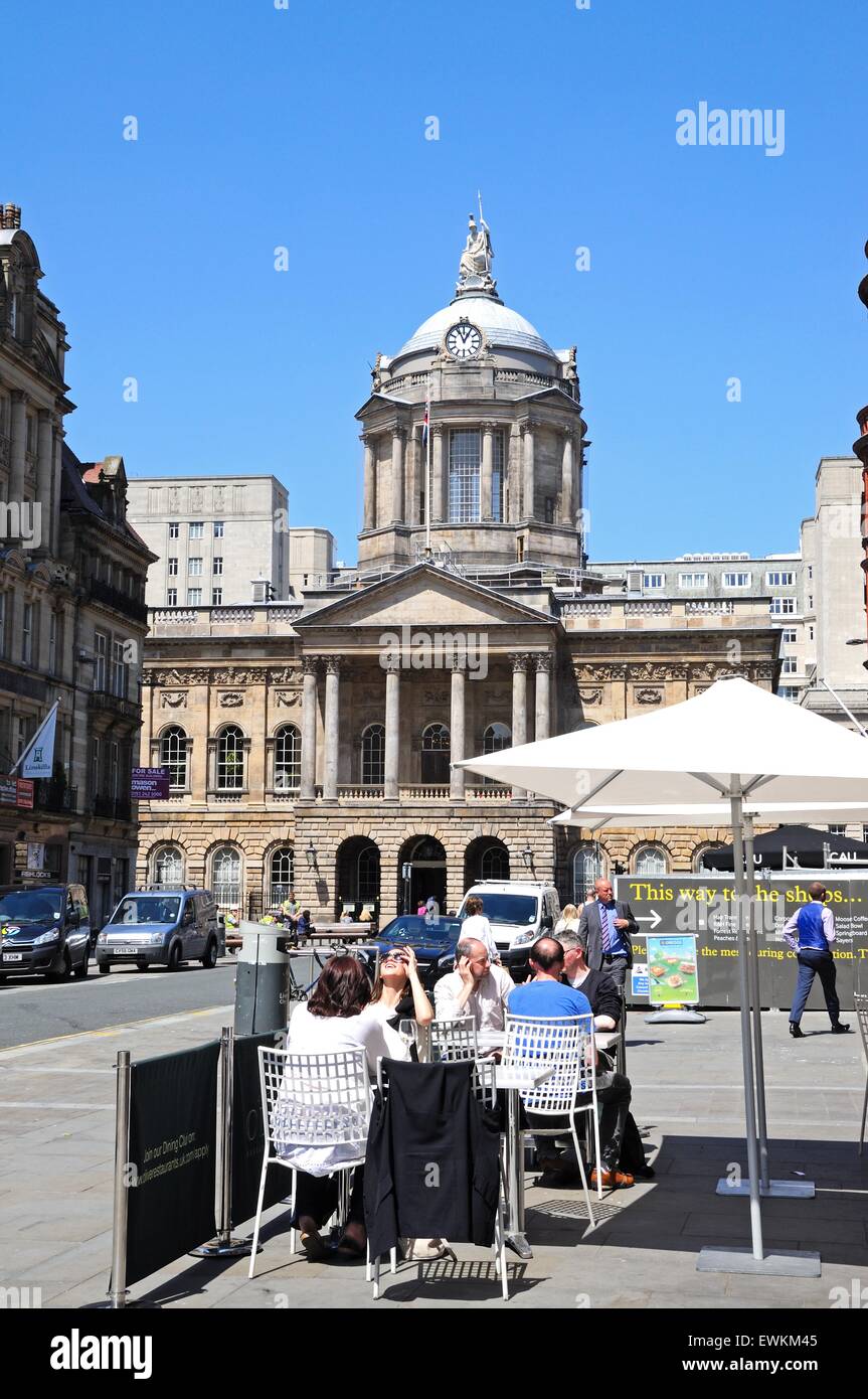 View along Castle Street towards the Town Hall at the far end with a pavement cafe in the foreground, Liverpool, England. Stock Photo