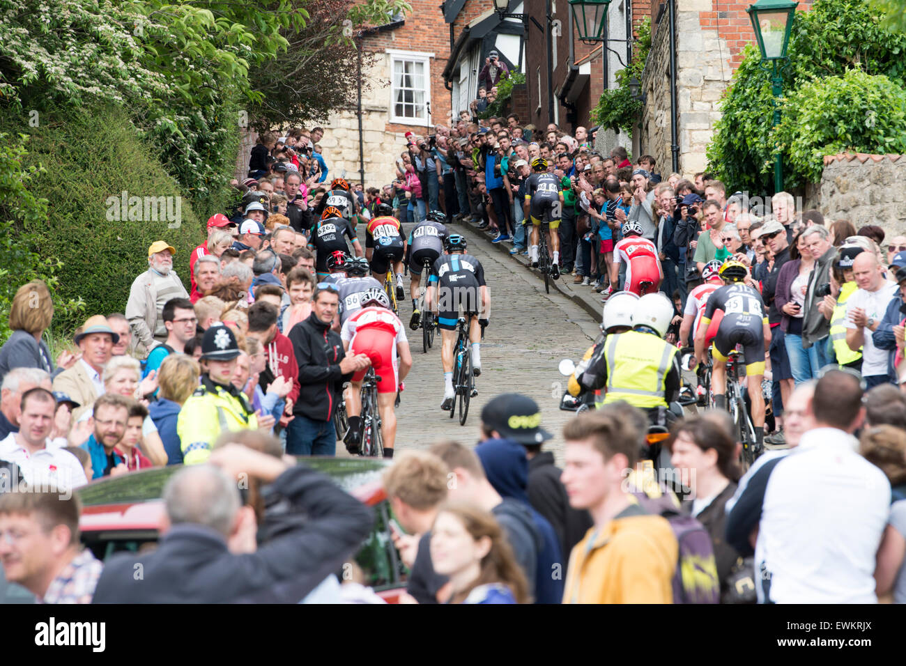 Lincoln, UK. 28th June, 2015. Riders climb Michaelgate during the British Cycling Road Race Championships at Lincoln, United Kingdom on 28 June 2015. Credit:  Andrew Peat/Alamy Live News Stock Photo