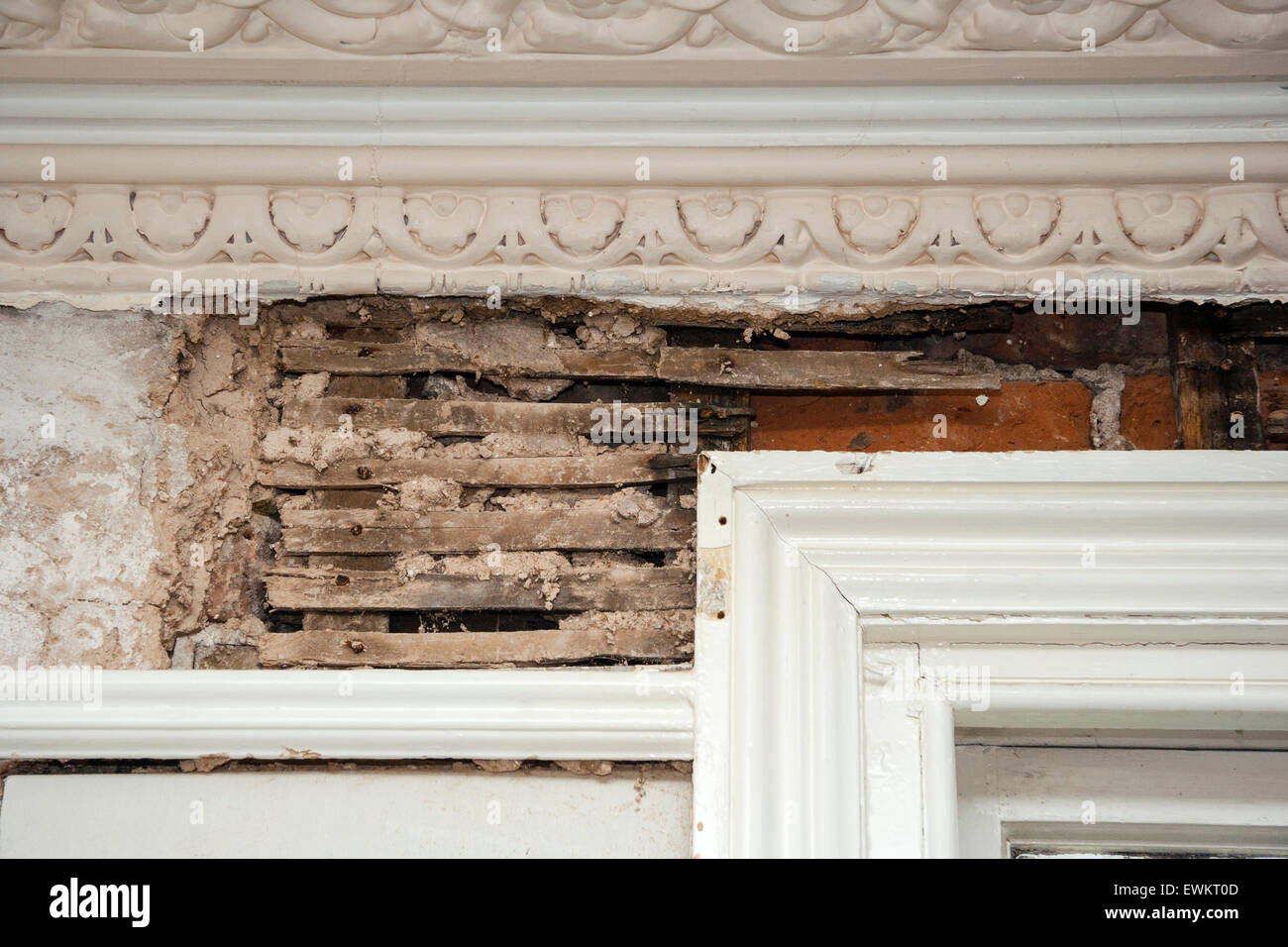 Interior Of Victorian House Showing Lath And Plaster Wall With