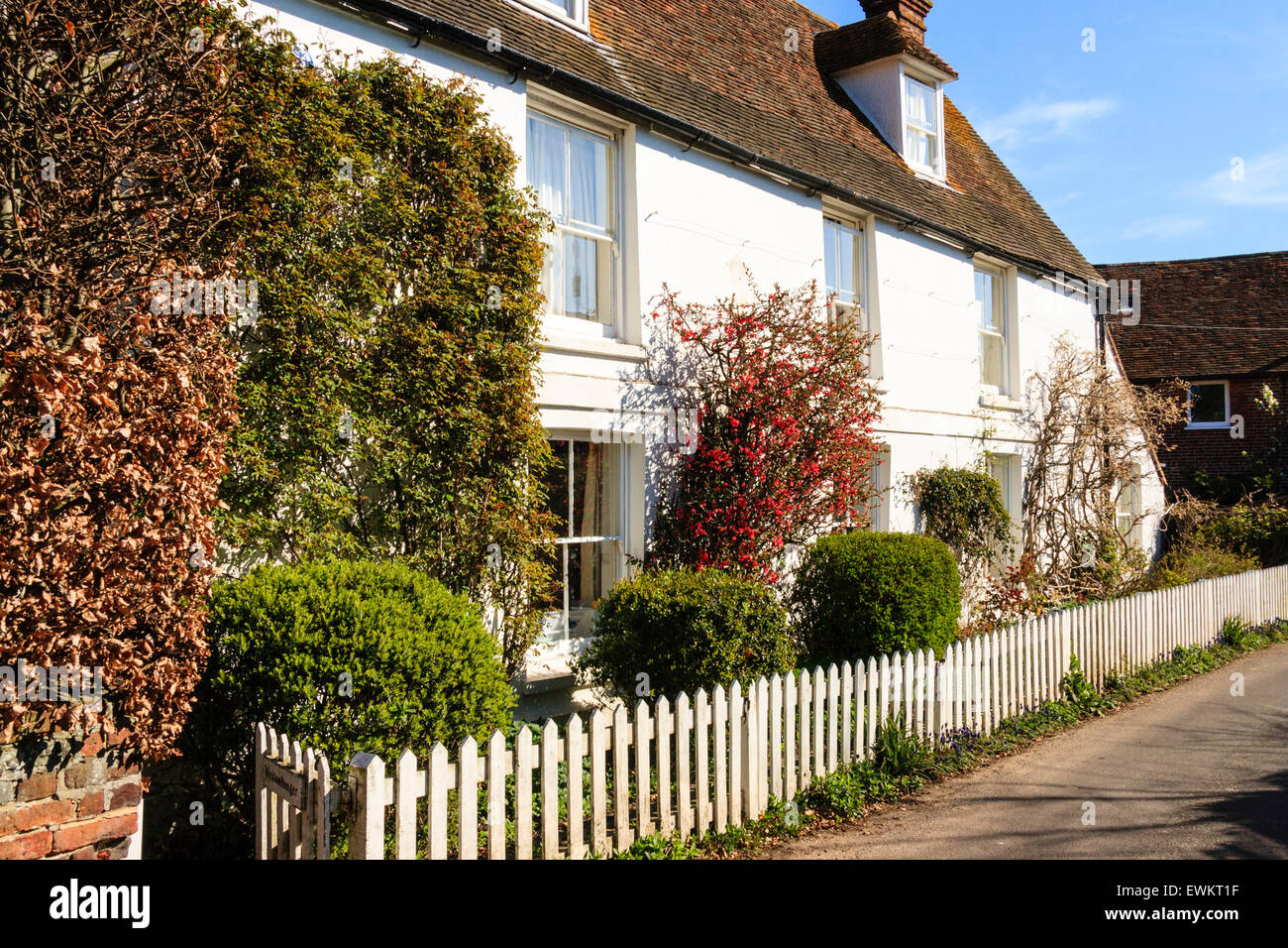 Ickham village, Kent in England. View along a large brick farmhouse