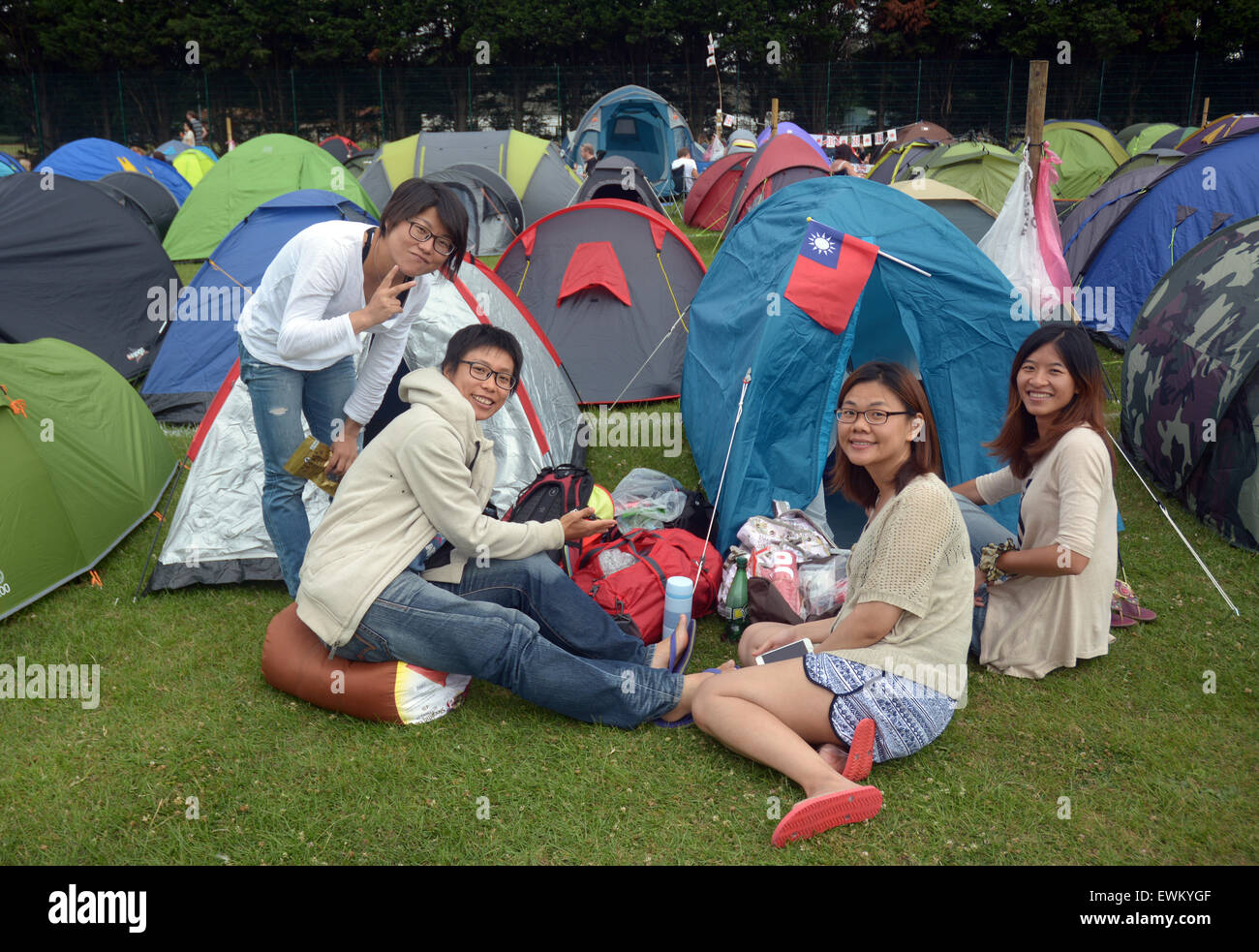 People in Wimbledon Park enjoy themselves as they camp out to ensure they are in the queue to get tickets for tennis. Stock Photo