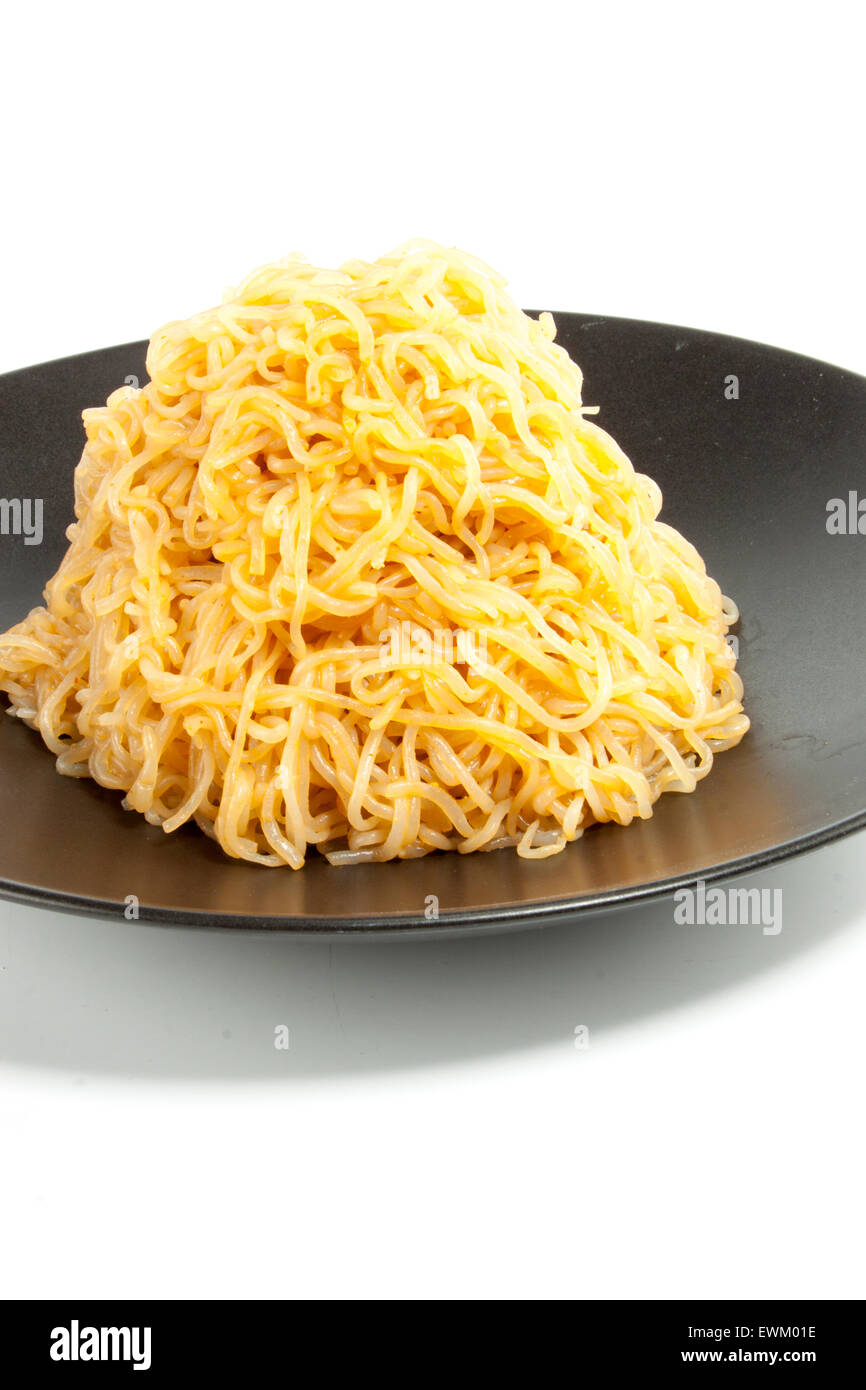 Asian shirataki noodles on a black plate Stock Photo Alamy