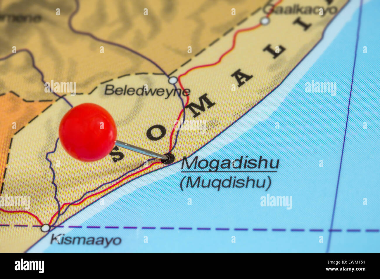 Close-up of a red pushpin on a map of Mogadishu, Somalia Stock Photo