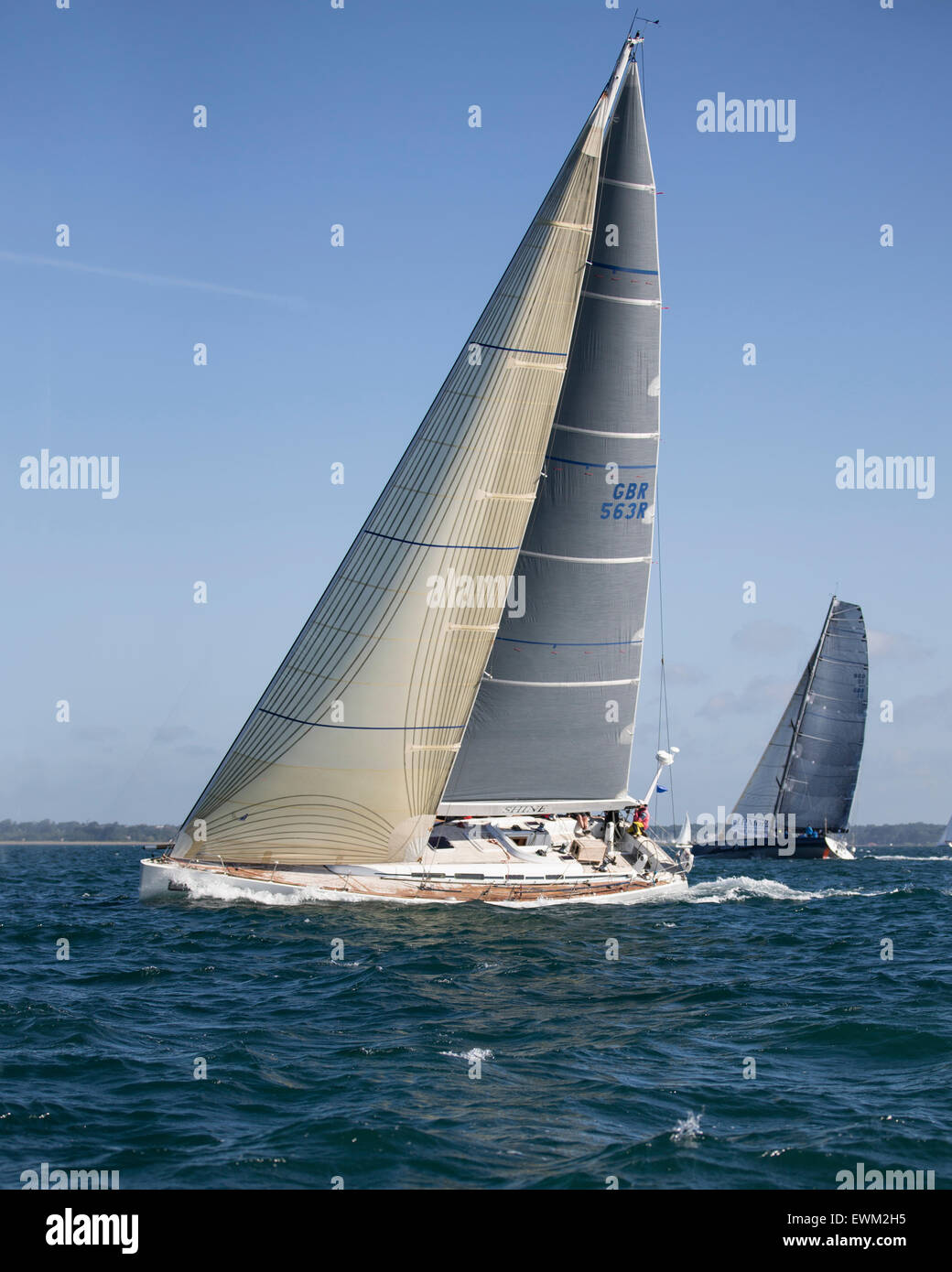 UK. 27th June, 2015. Grand Soleil 56 yacht 'Shine' (nearer) owned by Giles Redpath, and Imoca 60 'J P Morgan Asset Management Rosalba (further) taking part in the 2015 Round the Island Race Credit:  Niall Ferguson/Alamy Live News Stock Photo