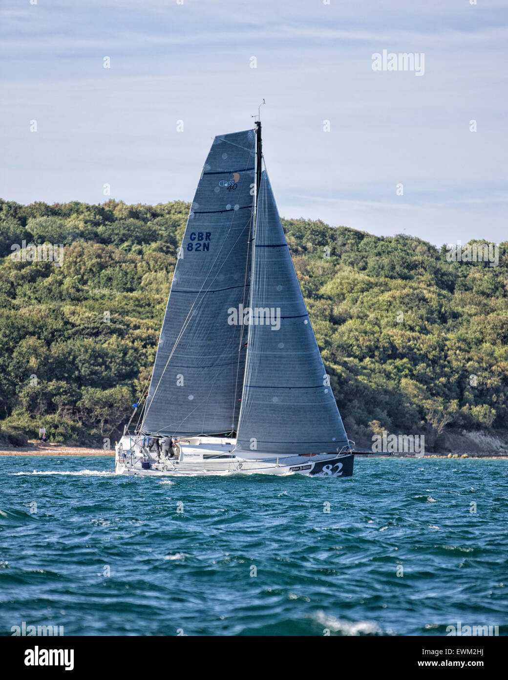 UK. 27th June, 2015. Class 40 Akilaria GBR 82N 'Forty Shades of Grey' taking part in the 2015 Round the Island Race Credit:  Niall Ferguson/Alamy Live News Stock Photo