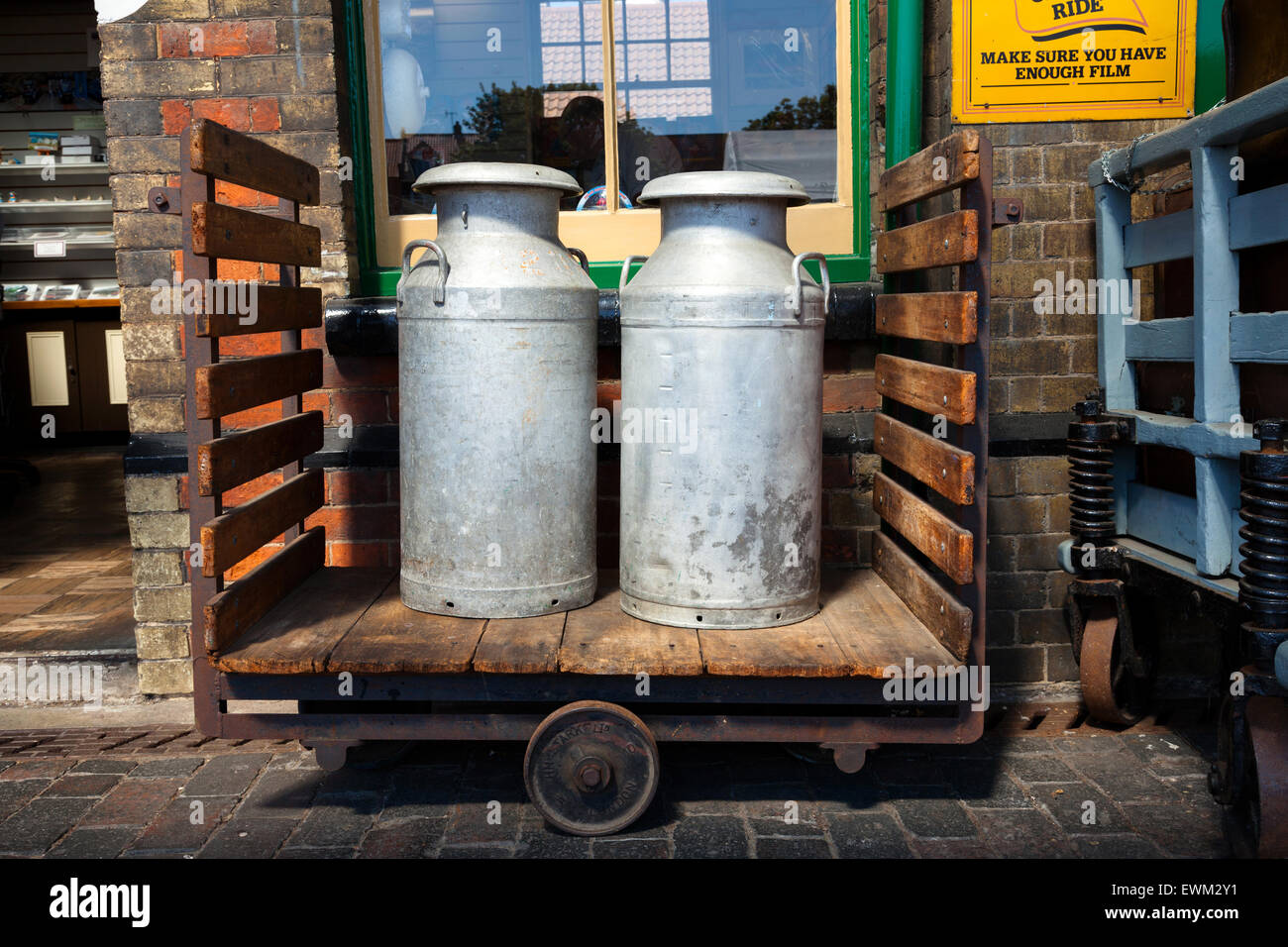 Milk churns on the platform at Sheringham Train Station, Norfolk, England, U.K. Stock Photo