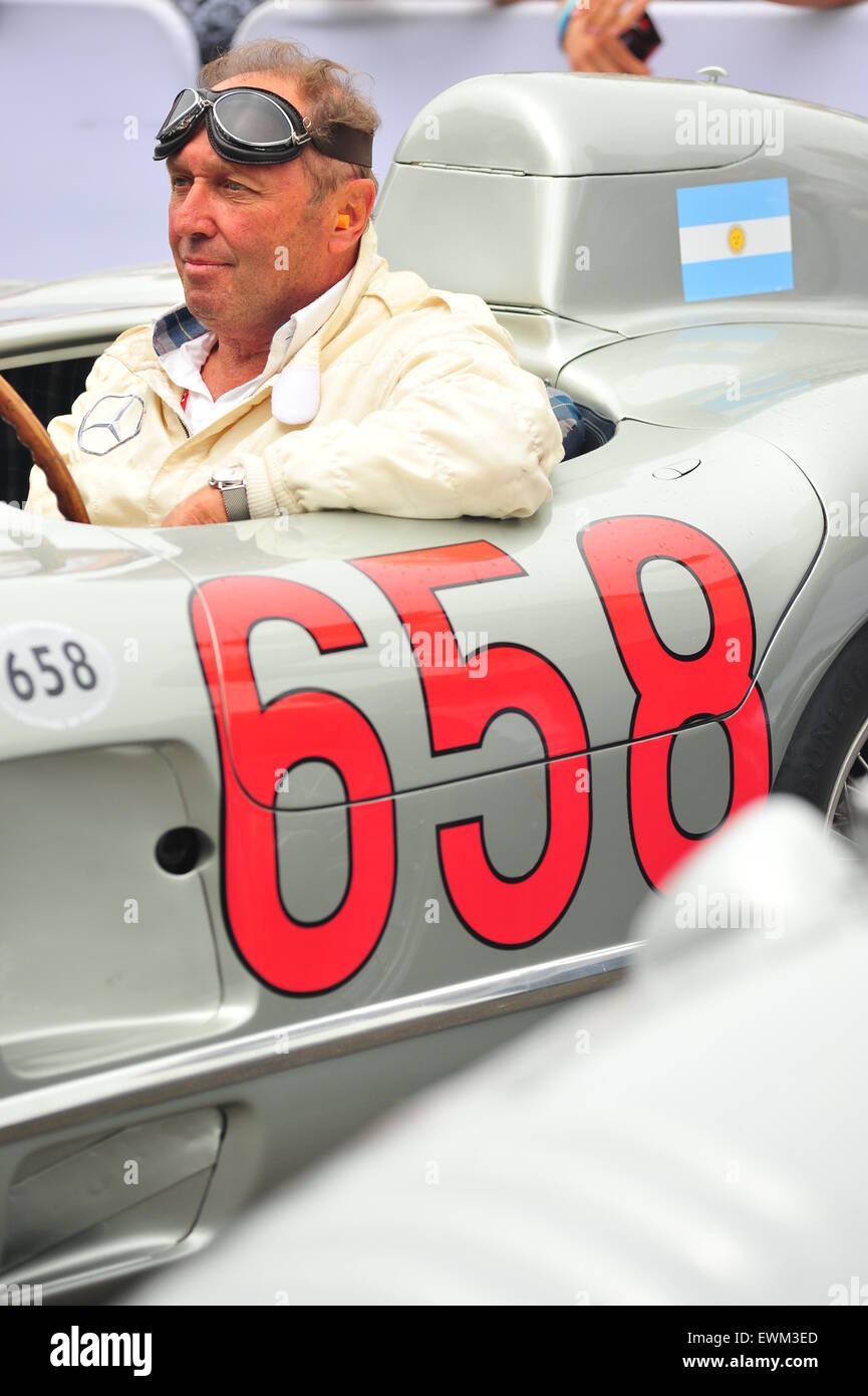 Jochen Mass at the Goodwood Festival of Speed. Racing drivers, celebrities and thousands of members of the public attended the Goodwood Festival of Speed to see modern and old racing cars and bikes in action. Stock Photo