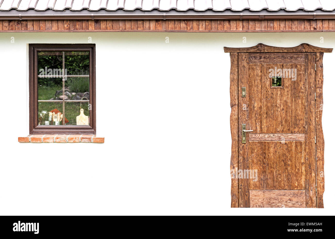Door and window on the facade of a house Stock Photo - Alamy
