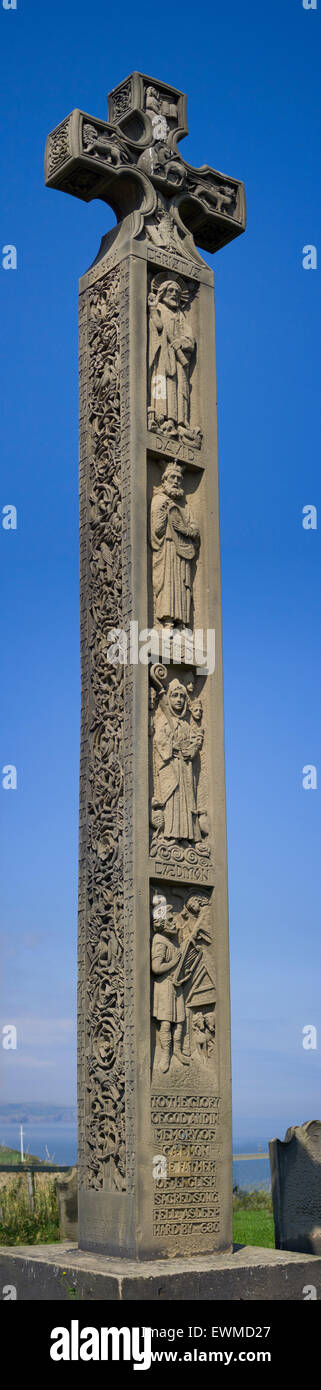 Interesting stone monument situated in Whitby Church burial area, beautifully carved with historical figures. Stock Photo