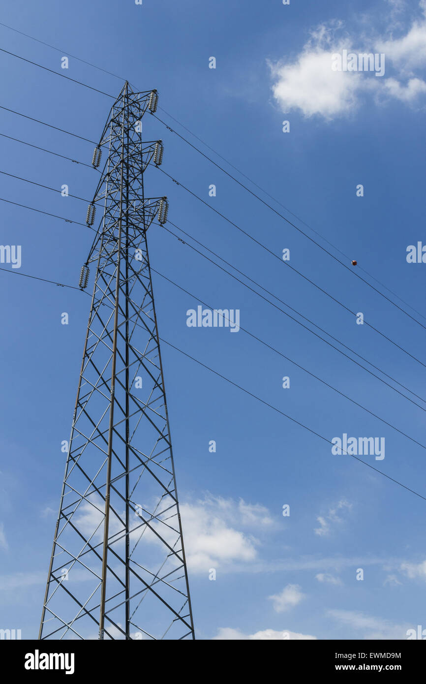 Pylon with blue sky and clouds in the background Stock Photo - Alamy