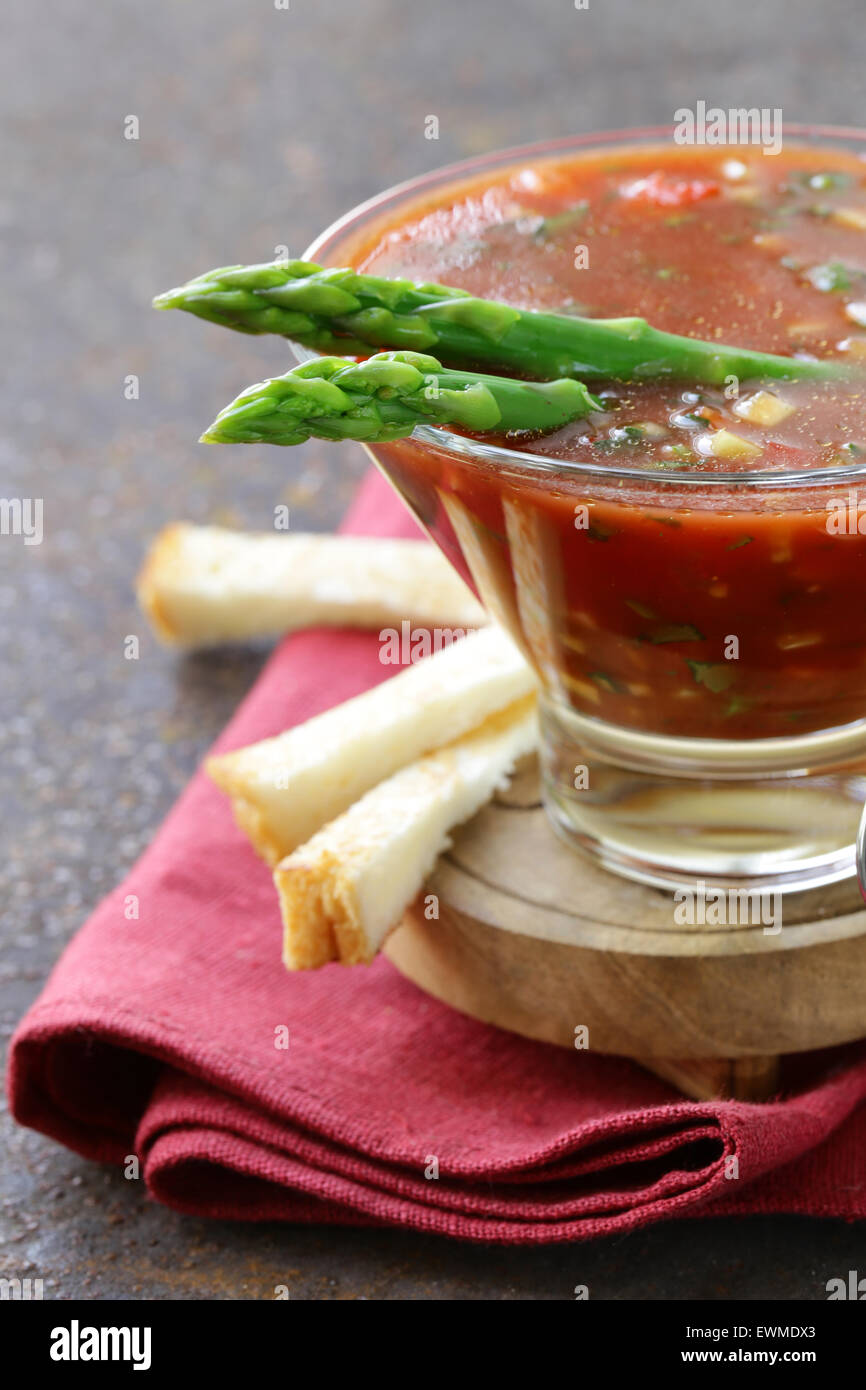 traditional Spanish cold tomato soup gazpacho with green asparagus and