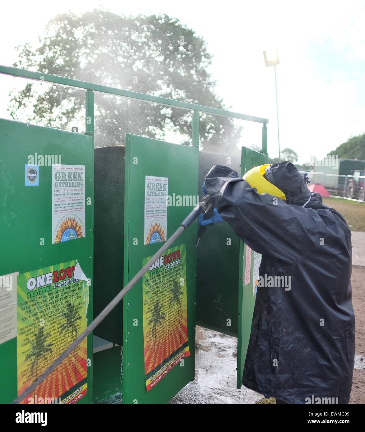Glastonbury Festival, Somerset, UK. 29 June 2015. As the exodus from the festival site gets underway the clean up begins in earnest and the notorious long drop toilets get the pressure washer treatment. Credit:  Tom Corban/Alamy Live News Stock Photo
