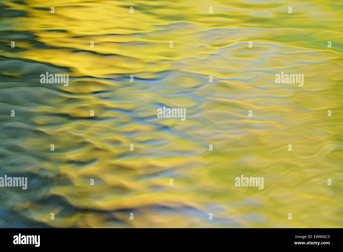 Reflection on wavy water surface Stock Photo - Alamy