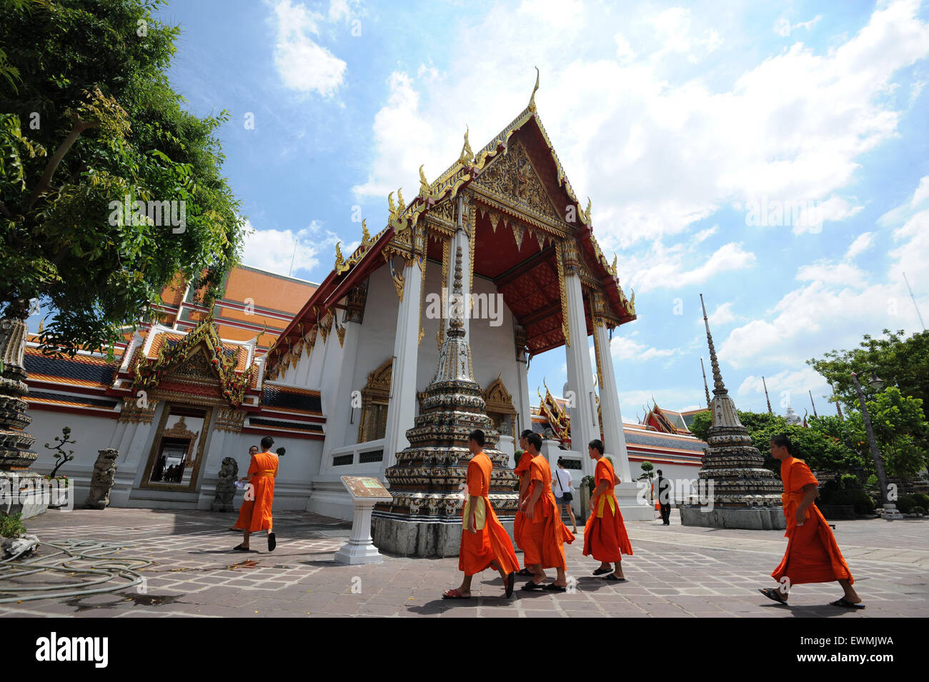 (150629) -- BANGKOK, June 29, 2015 (Xinhua) -- Monks walk at the Wat Pho Temple in Bangkok, Thailand, June 29, 2015. The number of tourists visiting Thailand reached more than 12.4 million between January and May this year, up 24.72 percent year on year, the Tourism Authority of Thailand (TAT) said on June 24. (Xinhua/Rachen Sageamsak) Stock Photo