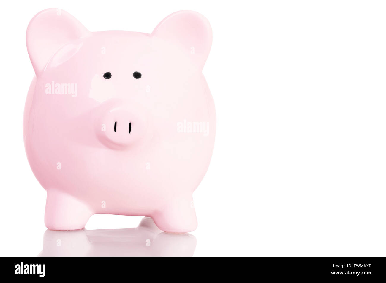 Stock image of pink piggy bank with copy space over white background ...