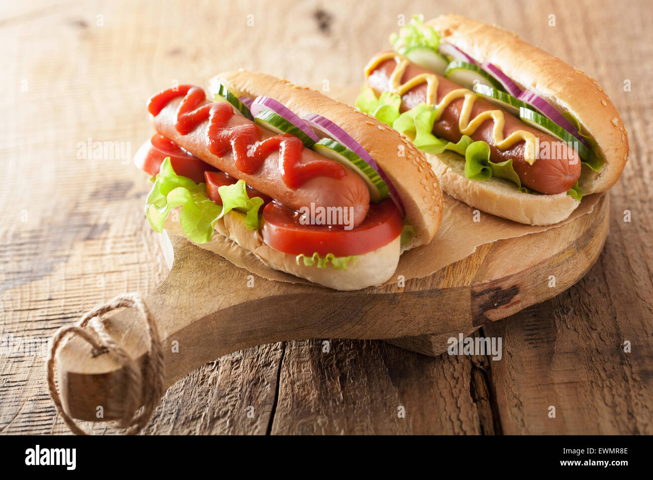 hotdog with ketchup mustard and vegetables Stock Photo Alamy