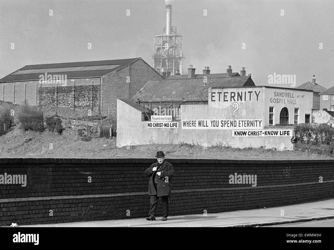 The ultimate question, spelled out on a wall at Smethwick, near Birmingham, West Midlands. 4th March 1971. Stock Photo