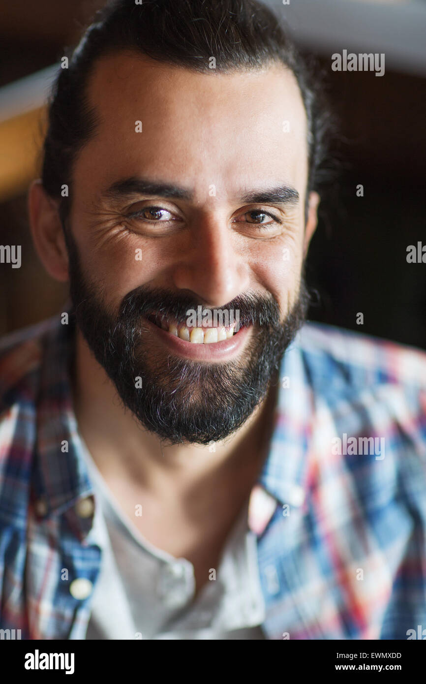 happy young man with beard and mustache Stock Photo