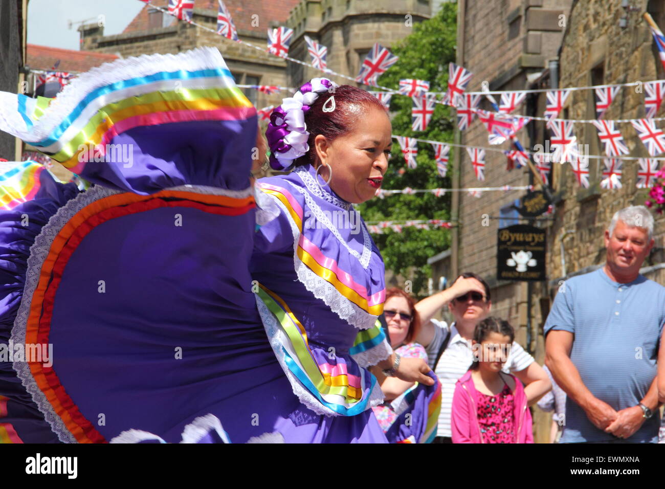 Mmbers of Son de America, a Latin American dance group perform outdoors at the Bakewell International Day of Dance, Bakewell UK Stock Photo